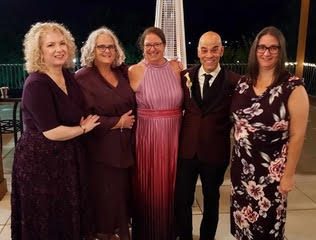 Kathy (Walling) Demaree C’91, Marj (Manter) St. John C’92, Lisa (Esposito) Lindner C’91, Anthony Astorino Nicola C’91, and Jennifer (Cullison) Stanford C’91 at Anthony’s wedding