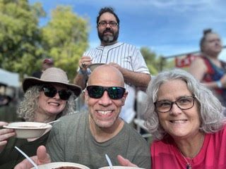 Kathy (Walling) Demaree C’91, Anthony Astorino Nicola C’91, Marj (Manter) St. John C’92, and Anthony’s husband, Joe, at the National Lentil Festival in Pullman, WA.