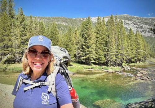 Lidia Soto-Harmon C’85 during summer challenge, hiking 12.5 miles with a 22 pound backpack at Yosemite
